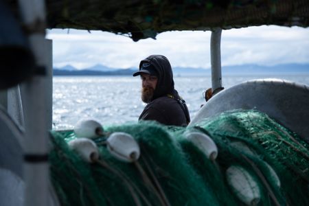 Carl Hernandez fishes for salmon. (National Geographic/Lukas Taylor)