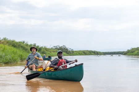 National Geographic Explorer Dr. Steve Boyes and Emmanuel Niyonkuru paddle down the Kagera River, collecting baseline data on the health of the river. (National Geographic/Philip Jones)