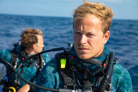 Underwater cameraman, Jeff Hester and host, Bertie Gregory looking out for the next dive site.  (credit: National Geographic/Adam Boyle)