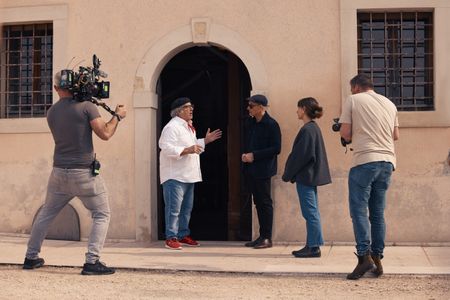 TUCCI IN ITALY - “Veneto” - Gabriele Ferron greets Stanley Tucci and food writer Valeria Necchio at the oldest working rice mill in Italy. (National Geographic/Matt Holyoak)GABRIELE FERRON, STANLEY TUCCI, VALERIA NECCHIO
