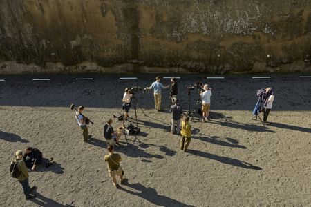 Cast and crew film at Herculaneum, behind-the-scenes of Pompeii: Out of Time with Tom Hiddleston. (National Geographic/Paolo Verzone)