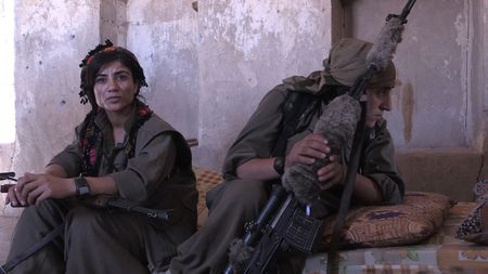 SINJAR, IRAQ - Women PKK female snipers fight alongside the men in Sinjar. They are part of the movement that eventually liberates Sinjar in November 2014. (photo credit:  Junger Quested Films LLC/Carsten Stormer)