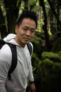 Coleford, UK - Albert Lin in a forest in Coleford, UK. (National Geographic/Hugh Campbell)