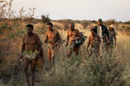 Will Smith and San Bushman Guide Kane Motswana follow the San people through the Kalahari Desert searching for food.   (credit: National Geographic/Kyle Christy)