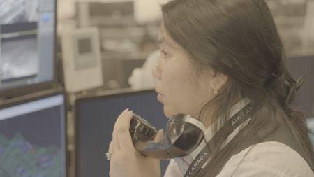 Divine Declaro, Manager, Operations at Air Canada, works to keep the three focus flights of the night on track. She deals with an injured flight attendant, an unruly passenger and a passenger on the loose on the apron. (Arrow International Media Ltd & Cantina Media)