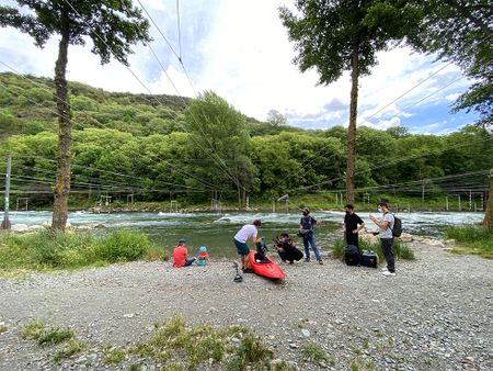 Gerd Serrasolses, Ali Casas, and their children are on their way to the river in Sort, Spain, while being filmed by cinematographer Alfredo DeJuan.  (National Geographic/Gene Gallerano)