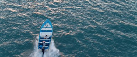 Fishermen Javier and Alan Valverde in Panga. (photo credit: National Geographic)