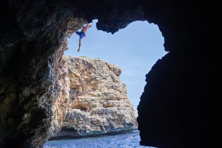 Chris recruits the help of Steph Davis, one of the best free solo climbers in the world, to train for a ëDeep Water Soloingì ñ no ropes, no safety equipment, just Chris climbing the rock face from the sea to the top of the cliff. This training will help prepare him for his final 600-foot climb on a wintery Swiss Alps Dam. (credit: National Geographic/Evan Paterakis)