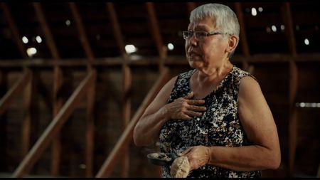 Investigator and survivor Charlene Belleau calls on Julian Brave NoiseCat to help document the search at St. Joseph's Mission Indian residential school. (Credit: Christopher LaMarca/Sugarcane Film LLC)