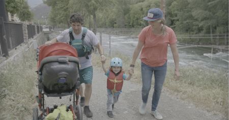 Gerd Serrasolses, Ali Casas, and their children are on their way to the river in Sort, Spain.  (National Geographic/Gene Gallerano)