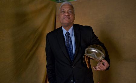 761st Black Panther Tank Battalion historian Wayne Robinson poses for a portrait with a 1938 tanker helmet gifted to him by E.G. McConnell, who served with the 761st Black Panther Tank Battalion in WW2. "Erased: WW2's Heroes of Color" tells the story of the 761st Tank Battalion’s role in the Battle of the Bulge in WW2. (National Geographic/Fabian Mandujano)