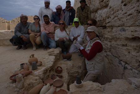 Kathleen Martinez and team with finds at the site.  Kathleen holds what they believe to be of Cleopatra. (credit: National Geographic)