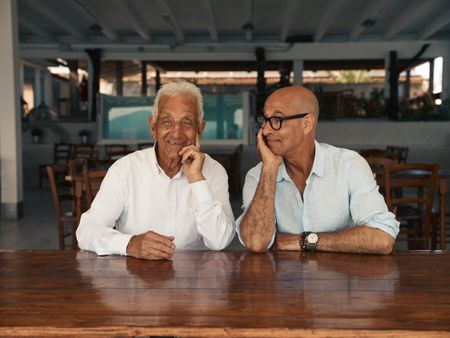 TUCCI IN ITALY - “Sardinia” - Stanley Tucci and 92-year-old Tonino Bertoleoni, the King of Tavolara. His family have laid claim to this tiny island since his great-great-grandfather took the reins in 1836. (National Geographic/Matt Holyoak)TONINO BERTOLEONI, STANLEY TUCCI