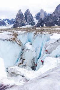Alex and the team drop down into the moulin.  (photo credit: National Geographic/Pablo Durana)