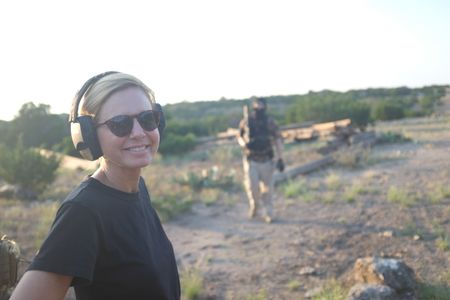 Mariana van Zeller attends shooting practice with members of the Black Cat Rifle Group. (National Geographic)