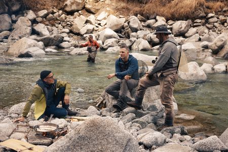 Stanley delves into the complex identity of Italyìs northernmost region, where many speak German as well as Italian. He fly fishes in a glacial river with locals. (credit: National Geographic/Matt Holyoak)