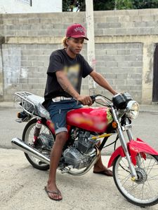 Tico poses for a photo in Santiago. (Credit: National Geographic)