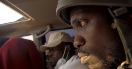 Bobi in the car wearing helmet.  (mandatory credit: Southern Films)