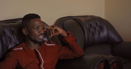 Bobi on the phone at home.  (Mandatory photo credit: Southern Films)