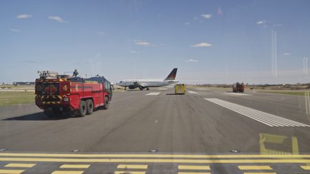 Toronto Pearson International Airport Fire Department trucks on a runway. (Arrow International Media Ltd & Cantina Media)