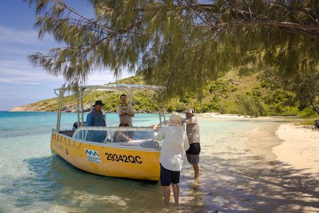 Secrets of the octopus crew, Ken Holmes, Dr. Alex Schnell, Flemming Høyer, Adam Geiger and Rory McGuinness, discussing plans to film Day octopus on the Great Barrier Reef.   (photo credit: National Geographic/Harriet Spark)
