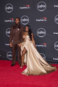 JONATHAN OWENS, SIMONE BILES