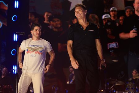 NICK JONAS, RYAN SEACREST