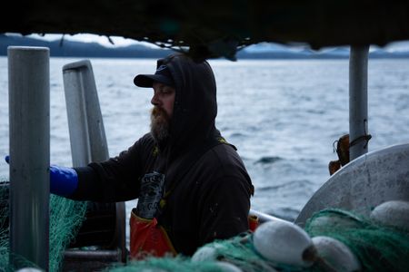 Carl Hernandez fishes for salmon. (National Geographic/Lukas Taylor)