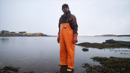 Marvin Agnot getting ready to head out on a seal hunt with his family. (National Geographic)
