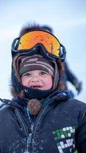 Sabastian Hailstone helps his grandparent's, Agnes and Chip Hailstone set up their camp in Kiwalik. (BBC Studios Reality Productions/Ashton Hurlburt)