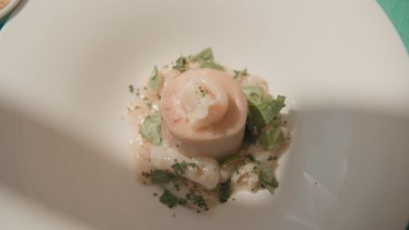 TUCCI IN ITALY - “Le Marche” - Shot of Uliassi's signature dish: veal shank cross-cut with cod fish tripe, topped with parsley, basil and celery seeds. (National Geographic)TUCCI IN ITALY