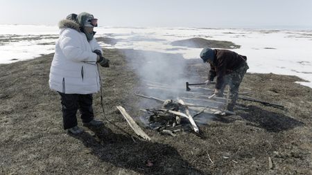 Teresa Pingayak with her husband, John Pingayak in the tundra, hunting birds. (National Geographic/Matt Kynoch)