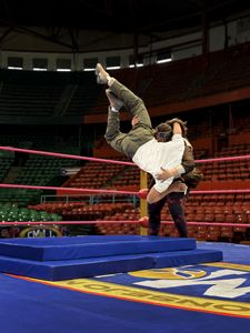 Antoni Porowski gets a lesson in Lucha Libre wrestling moves at the Arena Mexico. (National Geographic/Kate Hardie-Buckley)