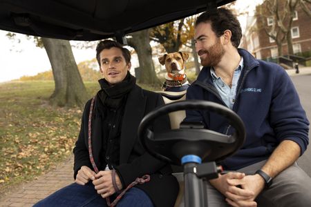 Antoni Porowski and his dog Neon get a tour of Governor's Island from one of its caretakers, Tristan. (National Geographic/Jose Alvarado Jr.)