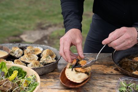 Gordon Ramsay plates his crab dish at the final cook. (National Geographic/Justin Mandel)