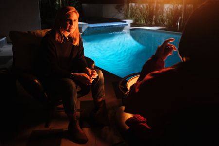 Mariana van Zeller interviews Michael about his past as an operations manager at Rodeo Recovery. (National Geographic)