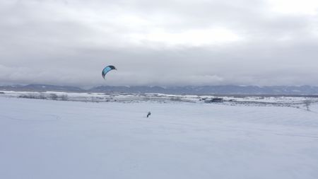 Sarah-McNair Landry Kite Skiing.   (photo credit: National Geographic /Ross McDonnell)