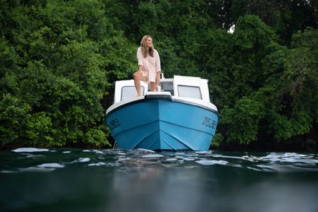 Dr. Alex Schnell on board a dive vessel in the Lembeh Strait. (National Geographic for Disney/Craig Parry)
