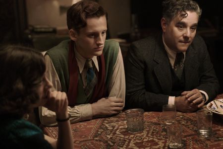 A SMALL LIGHT - Bel Powley as Miep Gies, Rudi Goodman as Peter van Pels, and Andy Nyman as Hermann van Pels in A SMALL LIGHT. (Credit: National Geographic for Disney/Dusan Martincek)