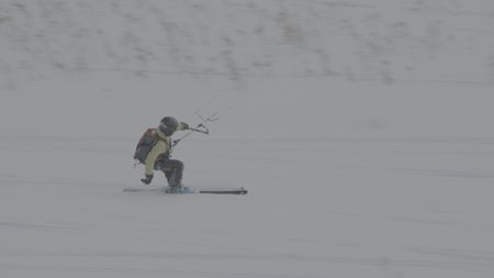 Sarah-McNair Landry Kite Skiing.   (photo credit: National Geographic /Ross McDonnell)