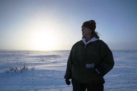 Sue Aikens hunts for ptarmigan in the tundra during the winter season for subsistence food. (BBC Studios Reality Productions, LLC/Jayce Kolinski)