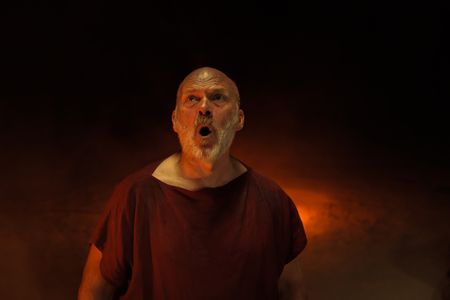 The Praetorian, played by Barry Aird, looks up in fear and horror at approaching pyroclastic surge coming to engulf Herculaneum. (National Geographic/Darrin Zammit Lupi)