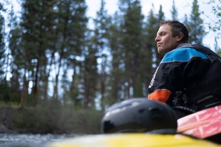 Professional kayaker Ben Stookesberry sits on his kayak and observes the water.  (National Geographic/Harrison Gayton)