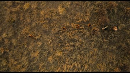 Will Smith travels with guide Kane Motswana and the San through the desert at sunset. (credit: National Geographic)