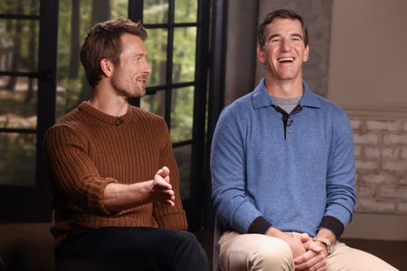 GLEN POWELL, ELI MANNING