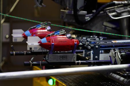 Camera tags attached to the submarine inside the Sub Hangar. (National Geographic/Mario Tadinac)