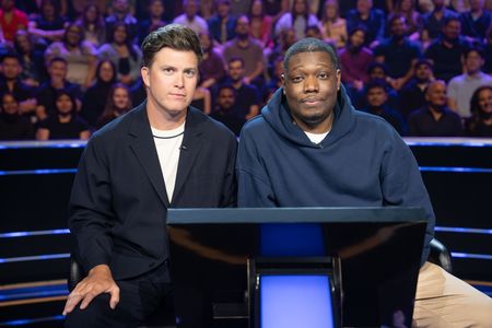 COLIN JOST, MICHAEL CHE