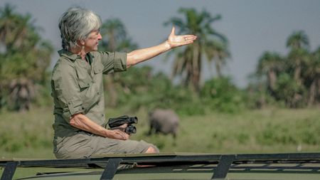 Elephant expert Joyce Poole poses for a photo. She has studied elephants for almost 5 decades and along with her husband has created the elephant ethogram, the first comprehensive library of thousands of elephant behaviors. There's nothing like this for any other species on earth. (National Geographic for Disney/Wim Vorster)