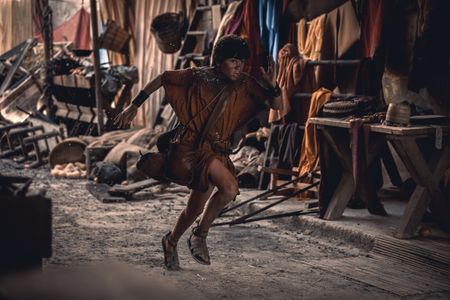 Avianius, played by Frankie Treadaway, sprints through the streets of Pompeii, desperately running to escape the pyroclastic flow. (National Geographic/Darrin Zammit Lupi)