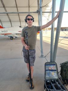 Sound recordist Phil Bax resting in the Shade at El Centro Naval Base. (Credit: National Geographic/Evan Parker)